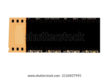 film strip isolated on white.(35 mm.) film frame.With white space.film camera. Film template. Royalty-Free Stock Photo #2126837945