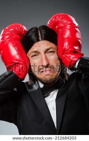 Man businessman with boxing gloves