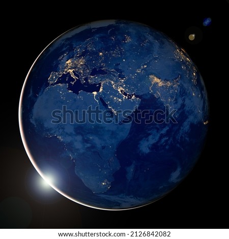 Earth photo at night with black background, City Lights of Africa, Europe, and the Middle East from space, World map on dark globe at sunrise, satellite photo. Elements of this image furnished by NASA Royalty-Free Stock Photo #2126842082