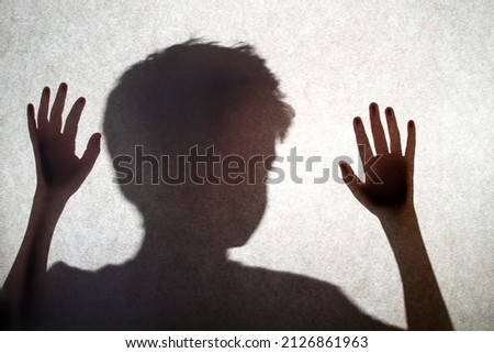The ghostly shadow of a child, the concept of fear and panic.