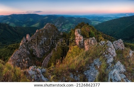 Mountain landscape at sunset. Slovakia, Vrsatec rocks, White Carpathian (Biele Karpaty) mountains in Slovak republic. Seasonal natural scene. Hiking theme.