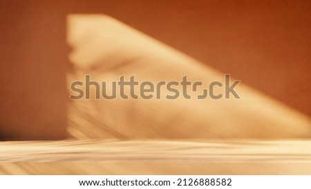 Minimal product placement background with palm shadow on plaster wall. Luxury summer architecture interior aesthetic. Creative product platform stage mockup. Royalty-Free Stock Photo #2126888582