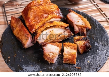 Grilled pork belly with crispy skin in chunks. Royalty-Free Stock Photo #2126903762