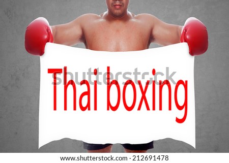 fight and competition sign with an red boxing glove holding a white banner and word thai boxing a business symbol of competitive sales or boxing specials day  