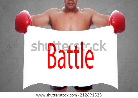 fight and competition sign with an red boxing glove holding a white banner and word battle a business symbol of competitive sales or boxing specials day  