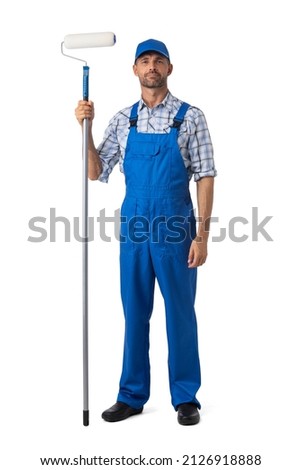 Mid adult professional house painter man in uniform with paint roller Isolated over white background