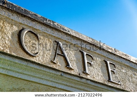 old cafe sign in germany - translation: coffee shop - photo