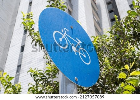 Bicycle blue round road sign