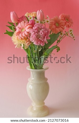 various kind of flowers in a vase