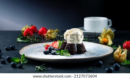 hot chocolate dessert fondant with ice cream, hot chocolate pudding with vanilla ice cream ball