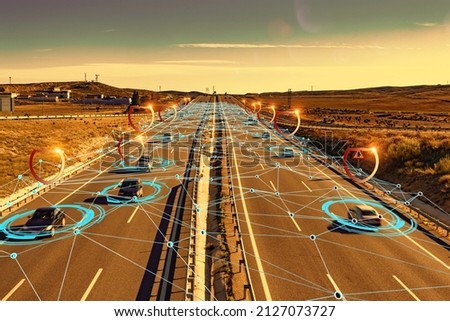 Autonomous car. Driverless car. Self driving vehicle.Car and trucks driving on a highway with technology assistant tracking information.