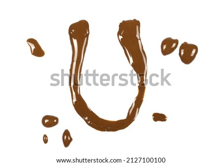 Wet mud alphabet letter U isolated on white, clipping path