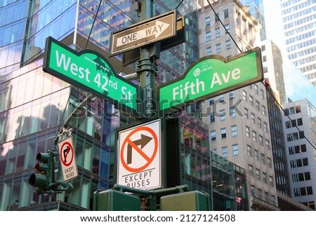 Green West 42nd Street and Fifth Avenue 5th Bryant Park traditional sign in Midtown Manhattan in New York City