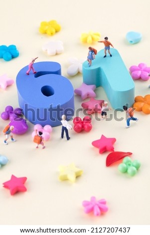 Miniature creative children's day cheerful children and number 61