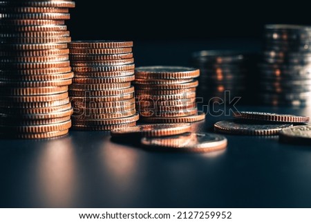 Pile of gold coins money stack in finance treasury deposit bank account saving . Concept of corporate business economy and financial growth by investment in valuable asset to gain cash revenue .