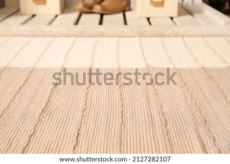 Stylish carpet in room, closeup
