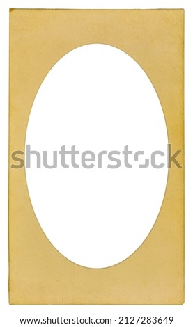 Old cardboard photo frame with ellipse vignette and empty space inside isolated on white background. Mock up Royalty-Free Stock Photo #2127283649