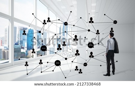 Elegant businessman in 3D office interior and social connection concept. Mixed media