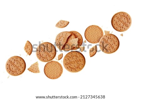 Digestive oatmeal biscuits falling isolated flat on white background flying biscuits collection Royalty-Free Stock Photo #2127345638