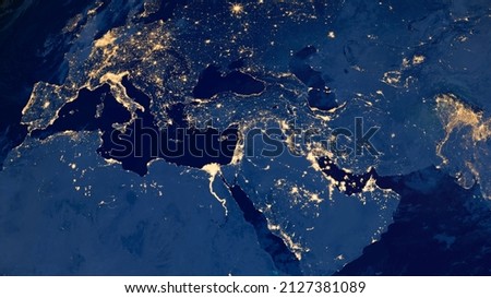 Earth photo at night, City Lights of Europe, Middle East, Turkey, Italy, Black Sea, Mediterrenian Sea from space, World map on dark globe on satellite HD photo.Elements of this image furnished by NASA Royalty-Free Stock Photo #2127381089