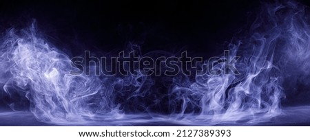 Panoramic view of the abstract fog. White cloudiness, mist or smog moves on black background. Beautiful swirling purple smoke. Mockup for your logo. Wide angle horizontal wallpaper or web banner. Royalty-Free Stock Photo #2127389393