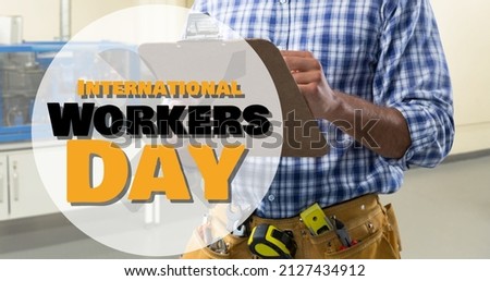 Digital composite of international workers day text symbol over caucasian building contractpr. blue-collar worker, skilled and industry concept.