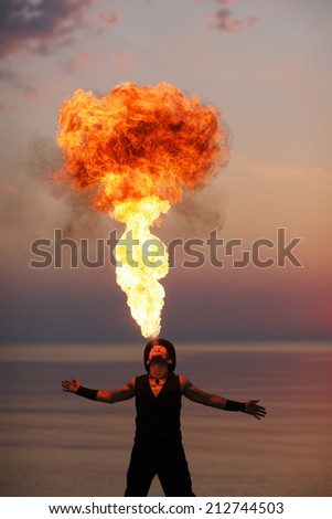 Fire performance solo; amazing fire-breathing