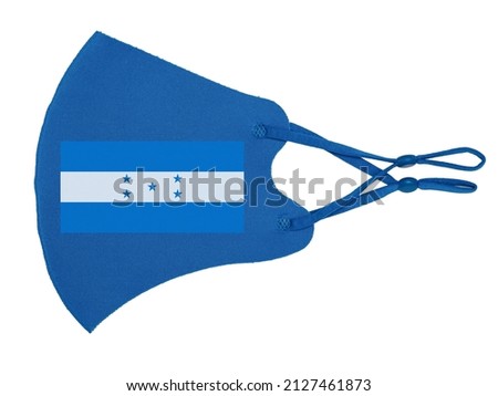 Blue cotton reusable cloth protective mask looks as flag of Republic of Honduras isolated on white background. 