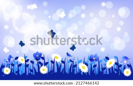 Spring blue color background with first flowers and butterflies.Life of insects in the meadow.