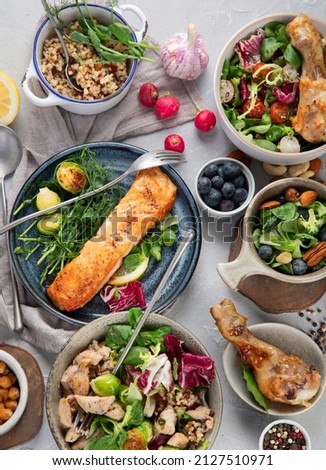 Healthy food assortment on light background. Dieting concept. Flat lay, top view, copy space Royalty-Free Stock Photo #2127510971