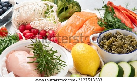 Healthy food assortment on light background. Clean eating concept.  Royalty-Free Stock Photo #2127513383