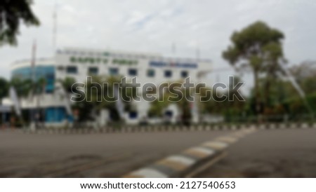 photo blur abstract background of the bulding and parking area