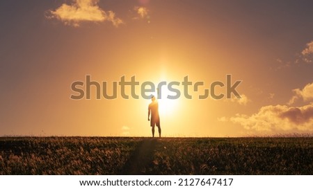 Strong determined man putting fist up to the sky. Mental and physical strength concept.
 Royalty-Free Stock Photo #2127647417