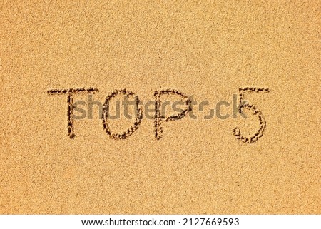 Top 5 written symbol sand
 Royalty-Free Stock Photo #2127669593