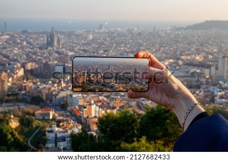 Photographing the panorama of Barcelona on a mobile phone