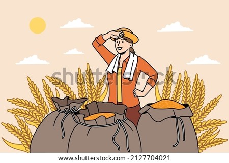 Agriculture farming and nature concept. Smiling woman farmer standing after working day with sacks full of harvested rye in field vector illustration  Royalty-Free Stock Photo #2127704021