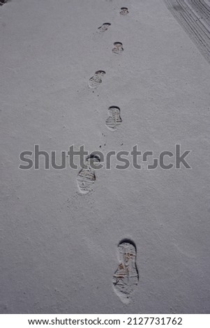 Footprints on layer of fresh snow