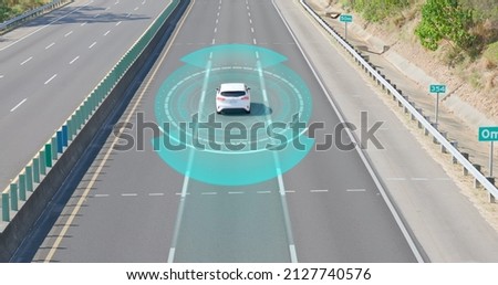 Autonomous car of Automotive sensing concept - Driver assistant system and Adaptive cruise control Royalty-Free Stock Photo #2127740576