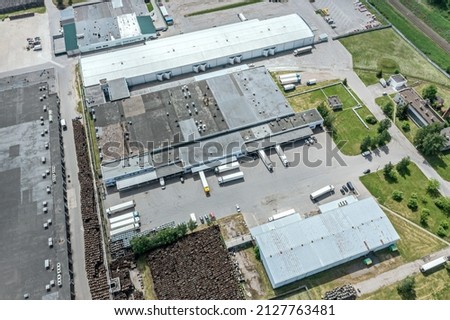 aerial view of the distribution center in industrial logistic suburb zone. drone photography.
