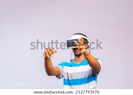 A handsome African man using VR glasses  Virtual reality experience 