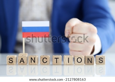 Imposition of sanctions against aggressor Russia. Economic and political sanctions against Russia concept Royalty-Free Stock Photo #2127808163