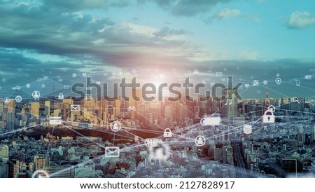 Modern cityscape and communication network concept. Telecommunication. IoT (Internet of Things). ICT (Information communication Technology). 5G. Smart city. Digital transformation. Royalty-Free Stock Photo #2127828917