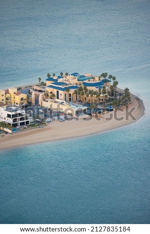 Close up view of luxury homes and villas on the palm jumeirah islands , vacation destination homes real estate in Dubai