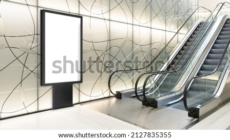 digital display next to escalator