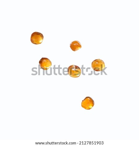 Pearls Bubble Tea closeup on white background. Single pieces pearl boba konjac brown sugar isolated tapioca use for topping milk tea drinks. Royalty-Free Stock Photo #2127851903