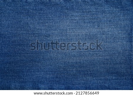 blue background, denim jeans background. Jeans texture, denim fabric. Royalty-Free Stock Photo #2127856649