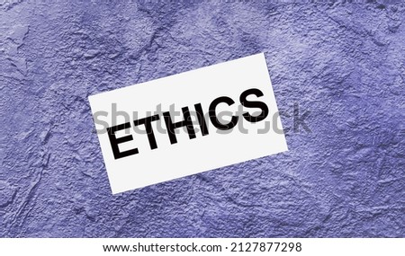 On a purple abstract background there is a white card with the text ETHICS