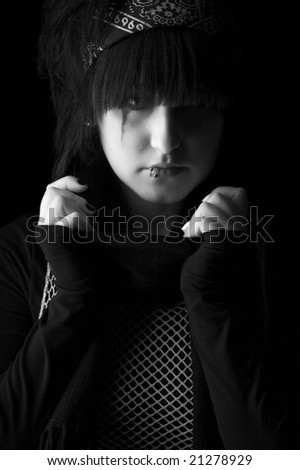 Depression of the young girl on a black background