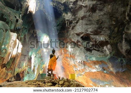 Sculpture in the cave with light