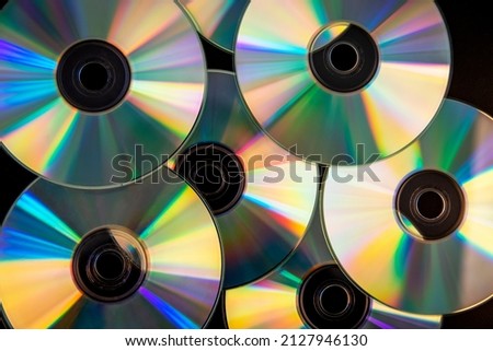 set of cd with color spectrum on black background